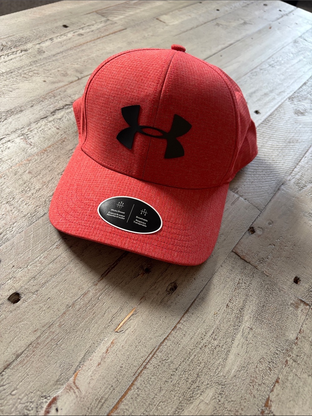 Men’s Under Armour Redish Orange Performance Hat with Black Logo